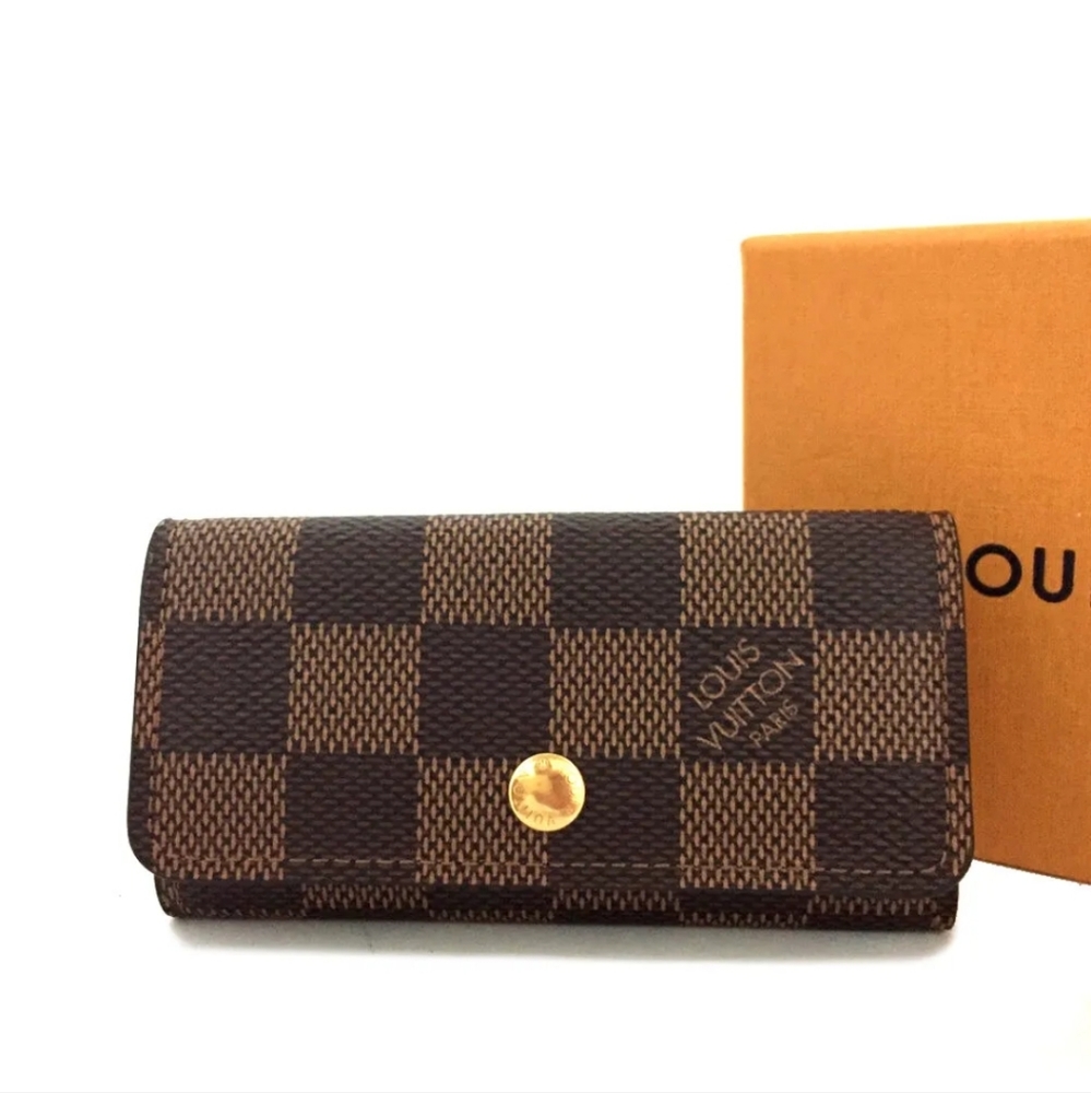 Brand New Rare Discontinued Louis Vuitton 4 ring Key Holder